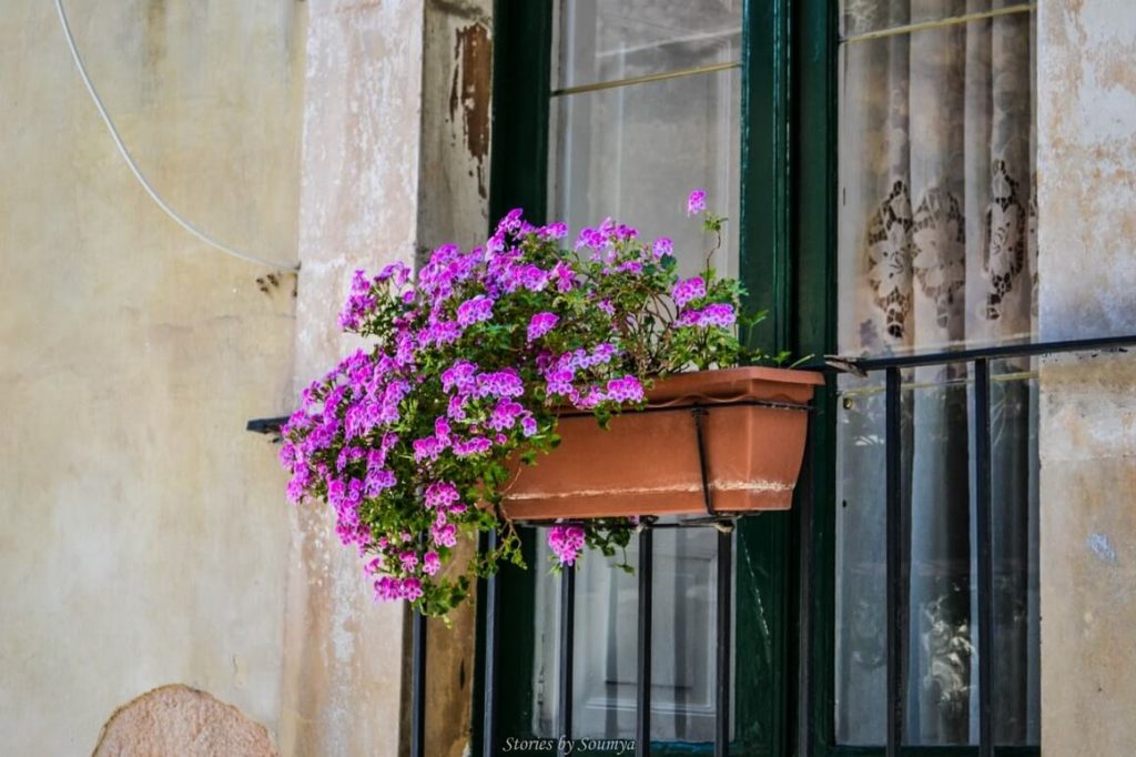 Balcony in Ragusa Italy | Stories by Soumya