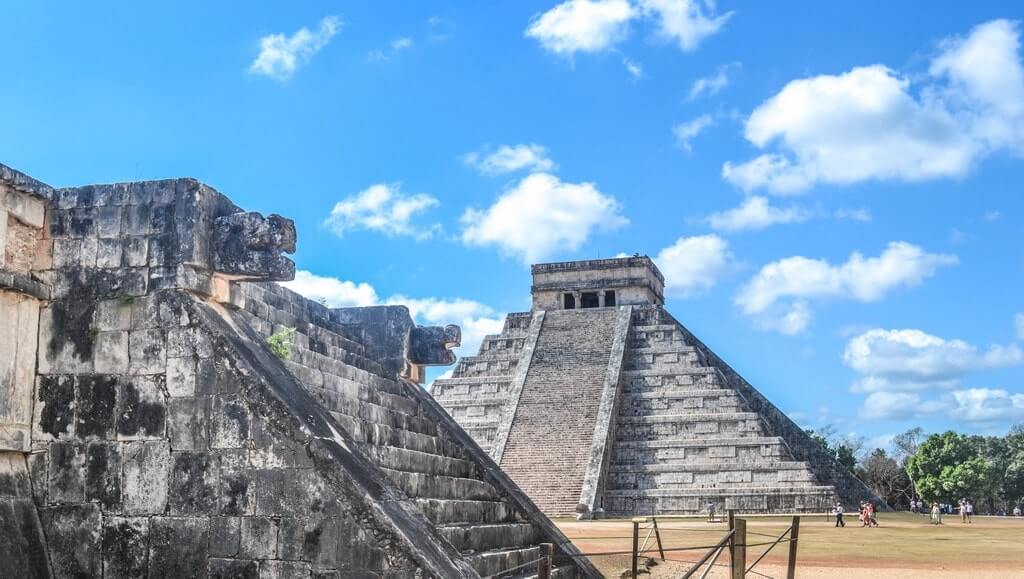 Pyramid of Chichen Itza with a snake head in front