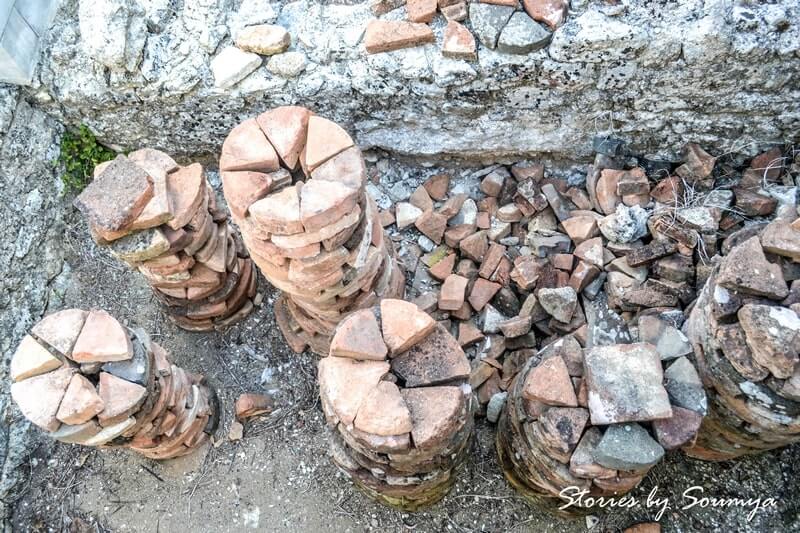 Wedge-shaped bricks at Conimbriga Roman Ruins | Stories by Soumya