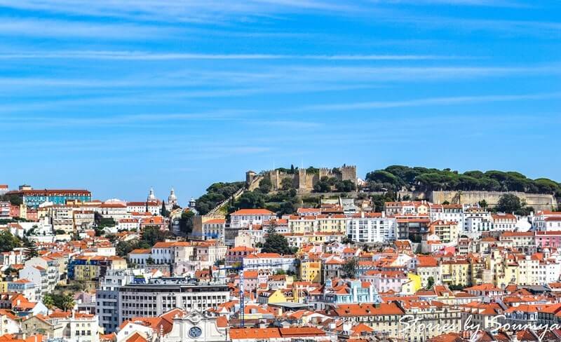 Lisbon city view with Sao Jorge castle in the background | Stories by Soumya