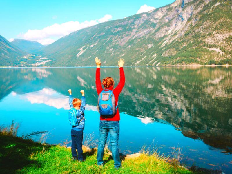 Mother and son hiking in the Alps