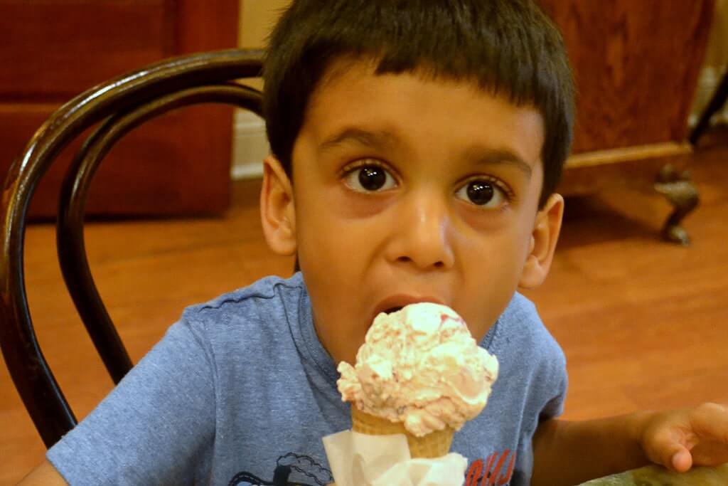 Child enjoying icecream at Leopold's in Savannah GA