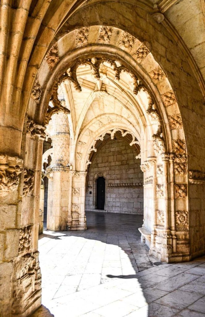 Beautiful arches of Jeronimos Monastery in Belem Portugal