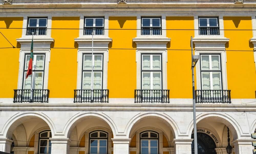 One of the most amazing places to get some good pictures of Portugal is the iconic Praca do Commercio with its yellow Pombaline buildings.