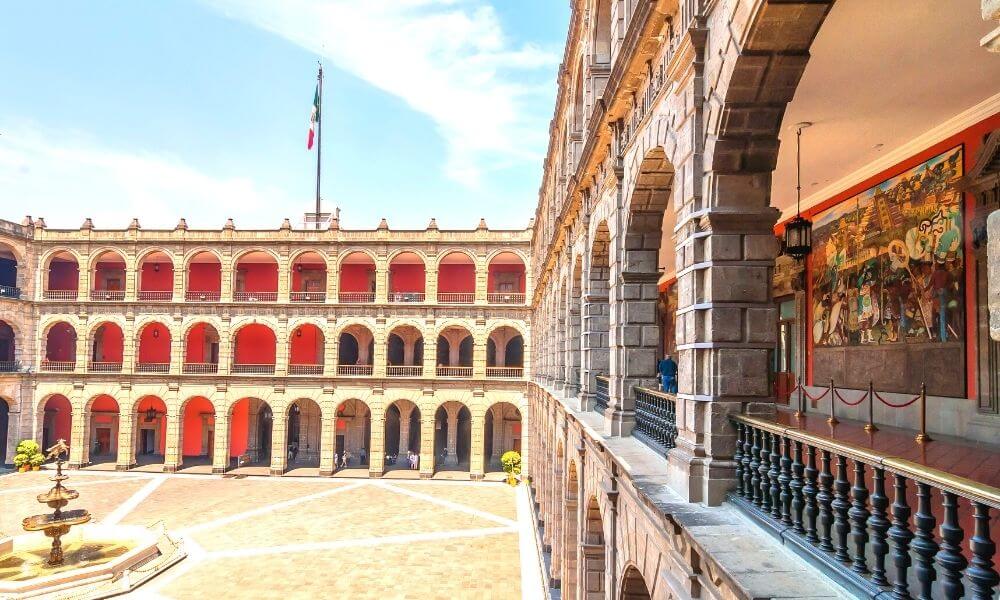 Courtyard of National Palace with a view of Diego Rivera murals on the right