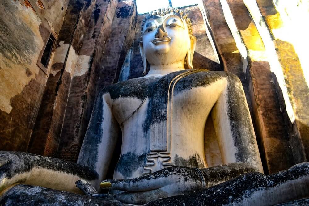 Massive Buddha statue in Wat Si Chum, Sukhothai Thailand