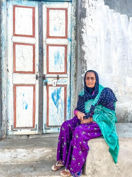 Woman at door in Nirona Village
