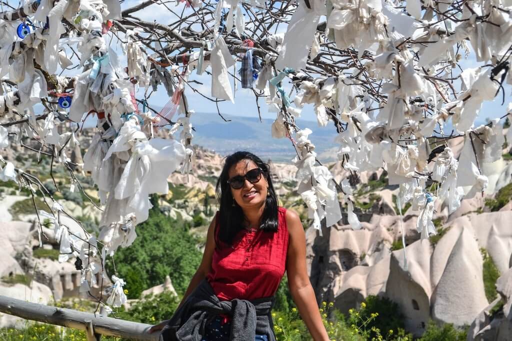 Author at Pigeon Valley with dream catcher tree - a must-see on Cappadocia green tour