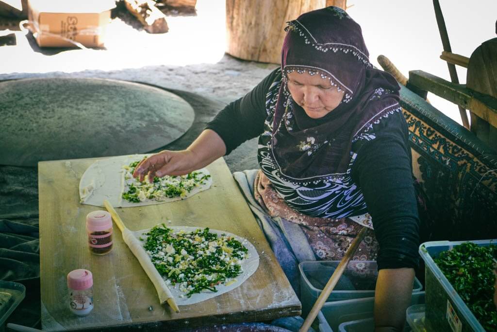 Turkish woman cooking gozleme in Cappadocia