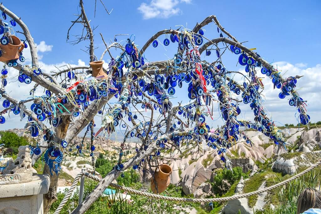 A tree in Cappadocia adorned with the Turkish evil eye!