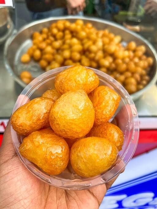 Bowl of Lokma behind Ortakoy Mosque in Istanbul