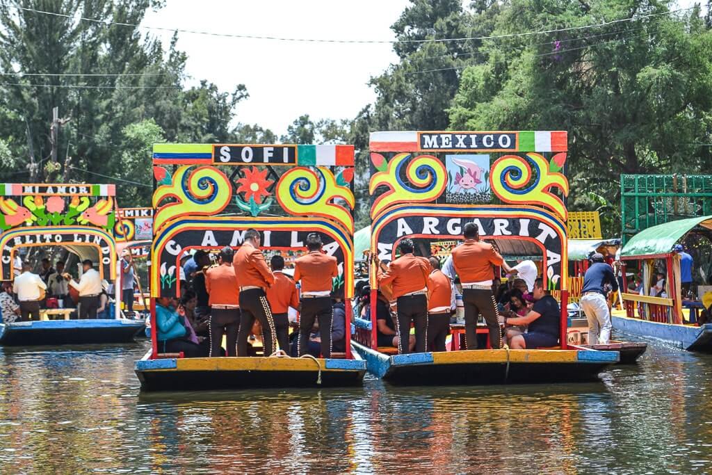 Mariachi bands performing on a Xochimilco tour