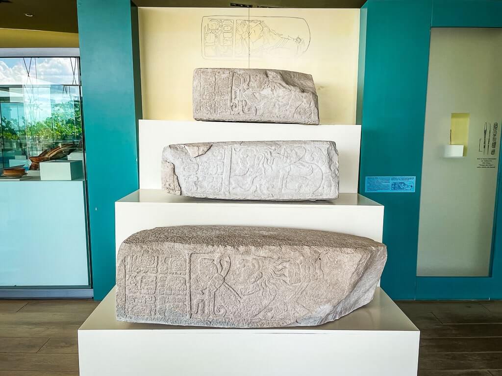 Stelae with engravings on display at Museo Maya in Cancun