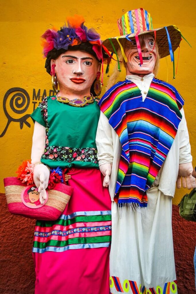 Central Mexican mojigangas dressed in traditional Mexican clothes