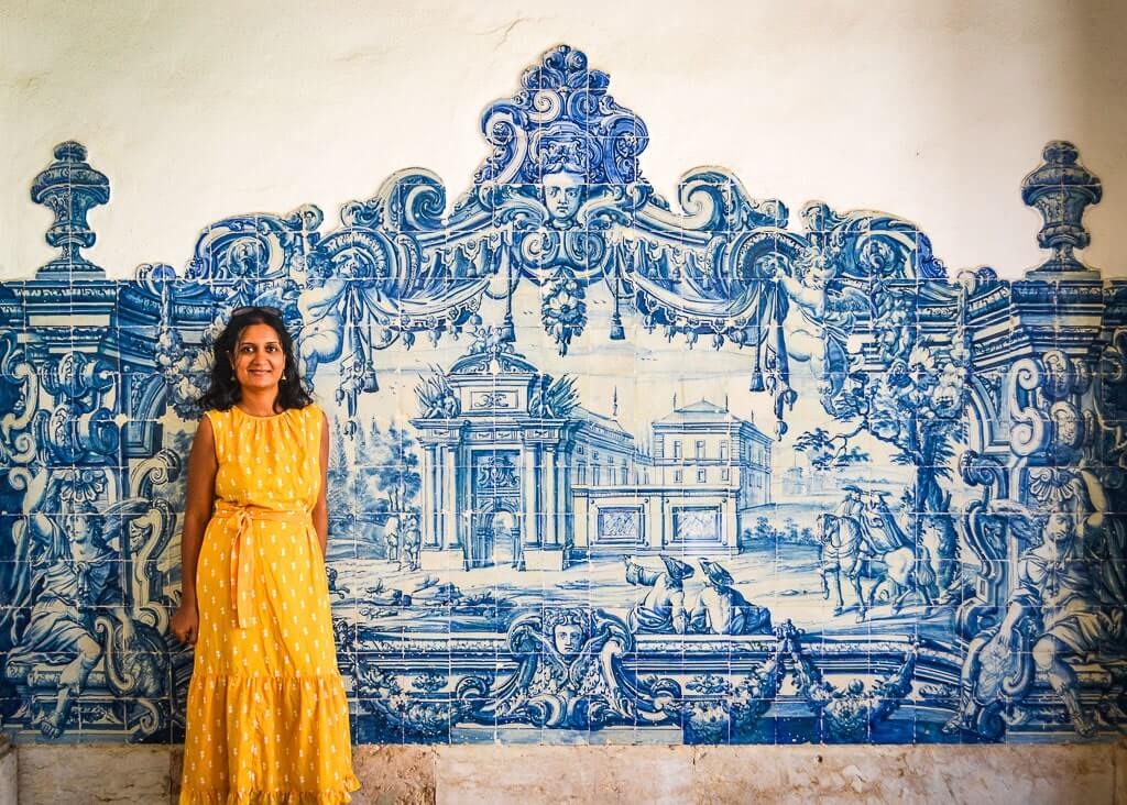 Author in front of an azulejo panel at the Monastery of Sao Vicente de Fora