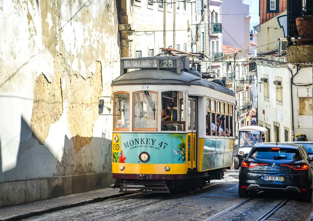 Tram 28 on the narrow roads in Alfama