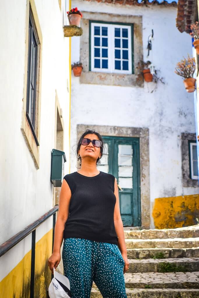 Author admiring the beauty and colors of Obidos