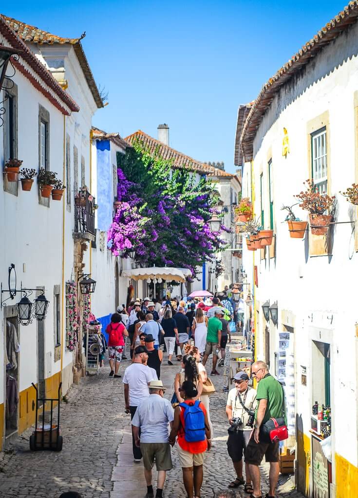 People walking on the streets of Obidos