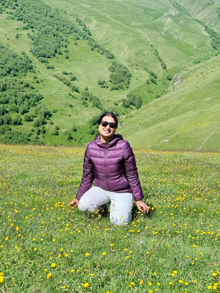 Author in the green meadows of Kazbegi