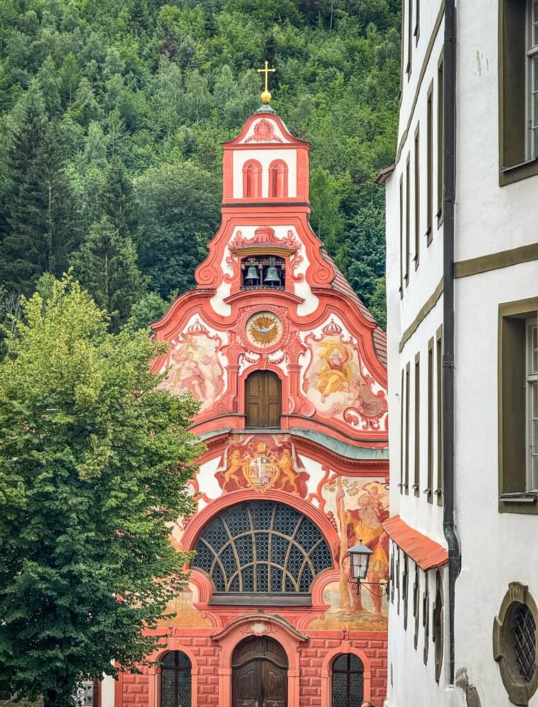 Spital Church in Fussen has beautiful Luftlmalerei paintings on its facade.
